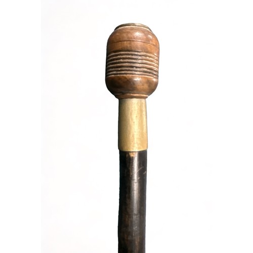 340 - Ebonised walking Stick with unusual treen pommel that unscrews to reveal a space to store a coin. St... 