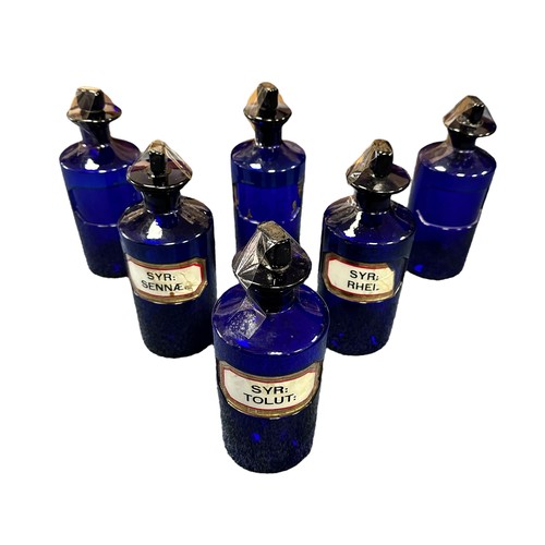 291 - 6 Cobalt Blue Apothecary Jars 24cm x 9cm, all 6 jars have chisel stoppers, one stopper has a chip on... 