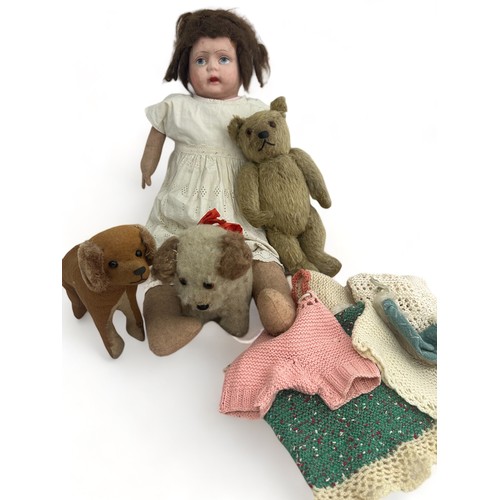 247 - A vintage doll, a vintage mohair teddy bear and two toy dogs. Makers unknown. Also some items of dol... 