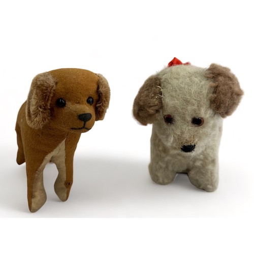 247 - A vintage doll, a vintage mohair teddy bear and two toy dogs. Makers unknown. Also some items of dol... 