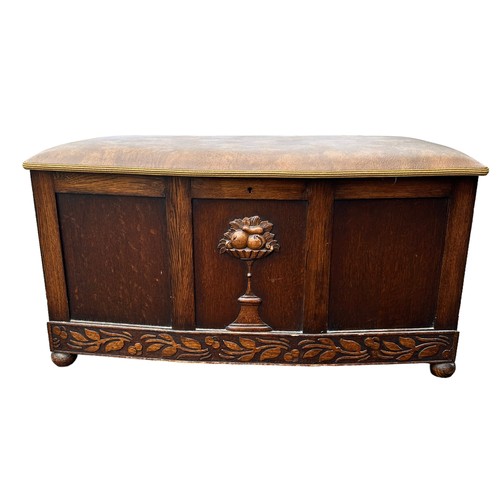 443 - Wooden blanket chest with upholstered seat, carved design to front and sides. Width 95cm, depth 51cm... 