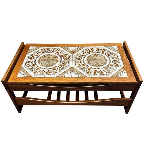 445 - A tile topped coffee table, width 98cm, depth 50cm, height 42cm.