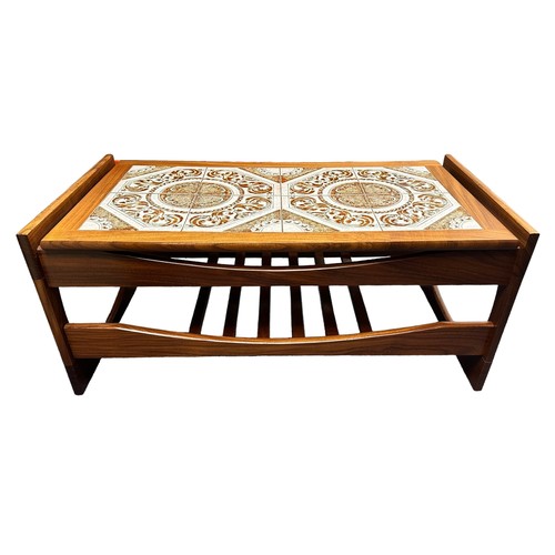 445 - A tile topped coffee table, width 98cm, depth 50cm, height 42cm.