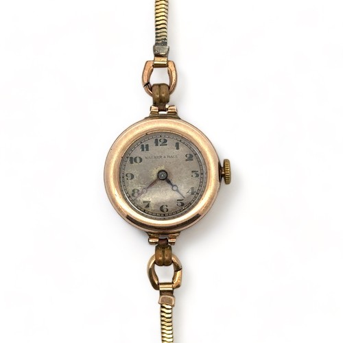 131 - Ladies Walker & Hall 9ct gold watch on plated strap. Sheffield hallmarks.