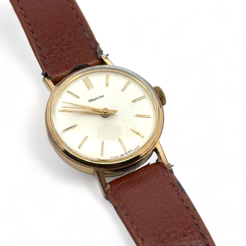 84 - Circa 1960s Westclox manual wind watch, Made in Scotland, Gold tone case and leather strap. Watch in... 