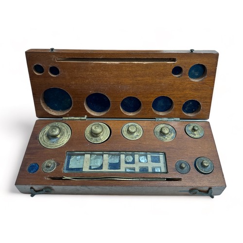 353 - Set of Gertling Chemists Balance Scales in glazed Mahogany cabinet together with a boxed set of Weig... 