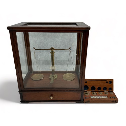 353 - Set of Gertling Chemists Balance Scales in glazed Mahogany cabinet together with a boxed set of Weig... 