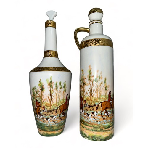 256 - Limoges, pair of hand painted liquor bottles featuring hunting scenes, with gold gilt surround bars ... 