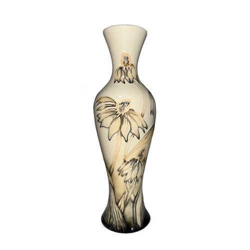 258 - Moorcroft, a Moorcroft tube lined “ Cornflower “ pattern tall vase, impressed mark to base, initiall... 