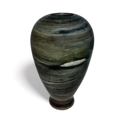 303 - Grey / green marble vase of baluster form. Height 20cm, width 12cm.