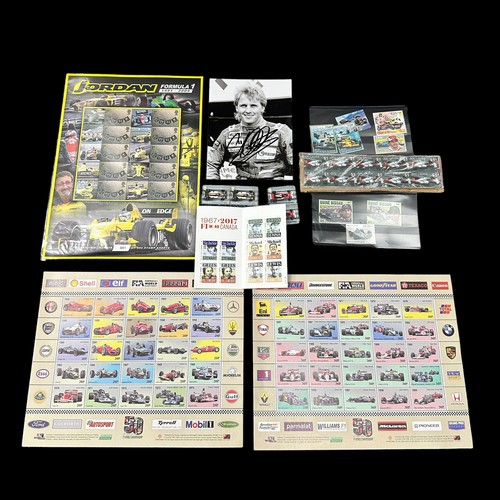 235 - A collection of Formula 1 stamps, from different years and countries. Also includes a signed Johnny ... 