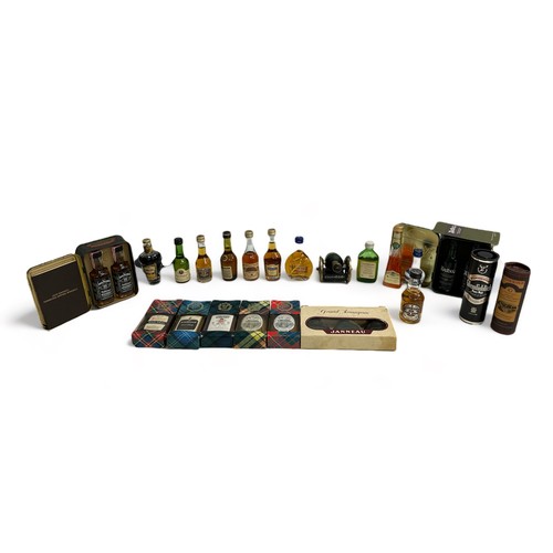 202 - A wide range of miniature liquors and whiskys  including Jack Daniels, Glenfiddich Pure Malt, Glenmo... 