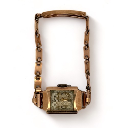 67 - YM 9ct gold ladies wristwatch and bracelet with rectangular face. Total weight 14.58g. AF.