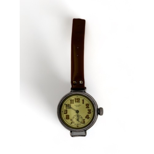 145 - A  military style/ trench WW1 watch signed Chancellor Dublin. Monogrammed and dated on reverse 25-5-... 