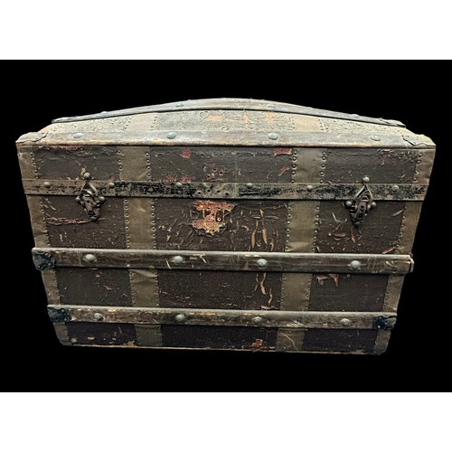 457 - Steamer Travel Trunk made from wood and canvas. Dome topped with wooden strapping, rope handle with ... 