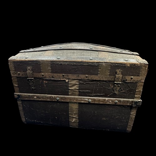 457 - Steamer Travel Trunk made from wood and canvas. Dome topped with wooden strapping, rope handle with ... 