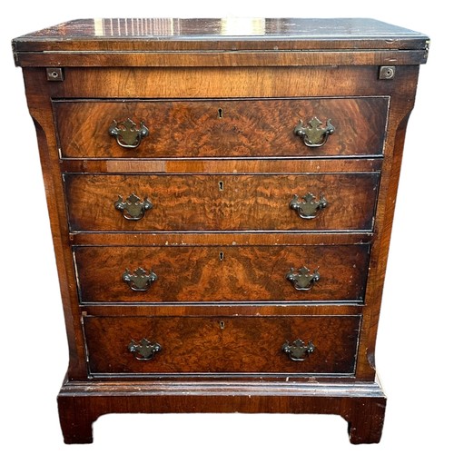 450 - Old reproduction walnut bachelors chest with two short over three long drawers and fold-over top. He... 