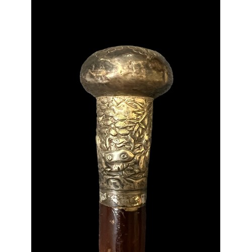 343 - Walking stick with white metal top with oriental design and Chinese inscription.