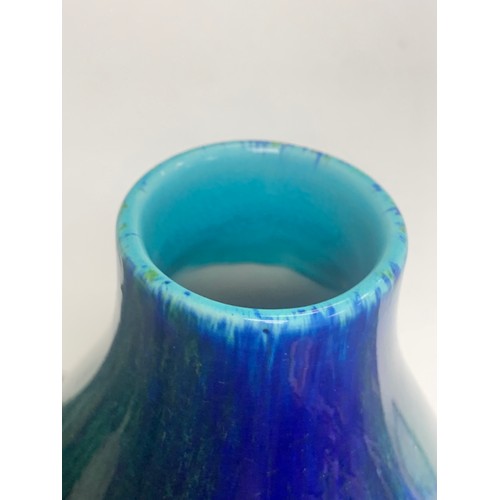 254A - Boch Freres, a Boch Feres art deco streak crackled glaze blue / green vase. Swolen form with cicular... 