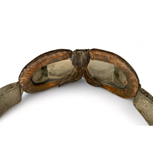 135 - WW2 RAF MK VIII Split Angled Glass Flying Goggles. Eye pieces set in leather padded cushion with adj... 