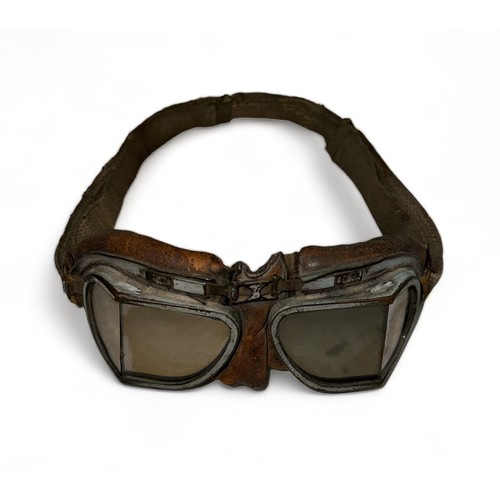 135 - WW2 RAF MK VIII Split Angled Glass Flying Goggles. Eye pieces set in leather padded cushion with adj... 