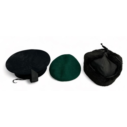 78 - Collection of Military Hats and caps to include two pilots caps, one green beret, one Russian cap, o... 