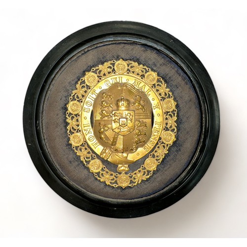 77 - Circular Wooden Plaque Depicting Royal Arms. Label attached to rear reads 