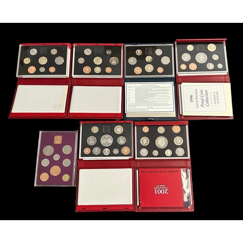 237 - Collection of proof cased sets (7) with 1970, 1986, deluxe proof cased sets FDC 1994, 1995, 1996, 19... 