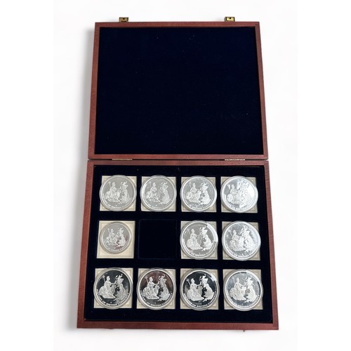 195 - History of British Currency set of 11 medallions each with certificate, in wooden presentation case.