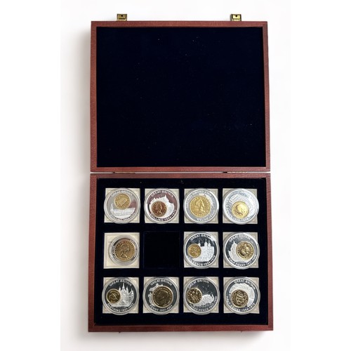 195 - History of British Currency set of 11 medallions each with certificate, in wooden presentation case.