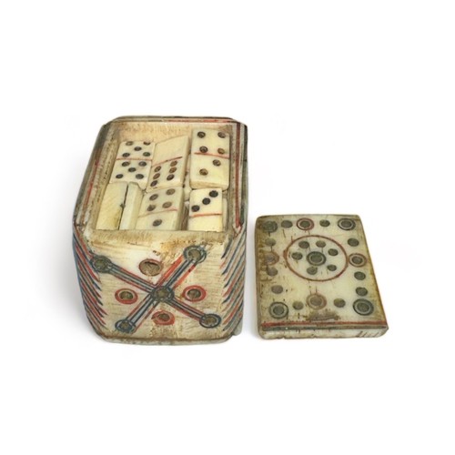 95 - 19th Century Napoleonic Prisoner of War carved bone dominoes, contained within a rectangular sliding... 