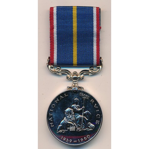 31 - A boxed National Service medal to 5384452 SPR E. POWELL RE.