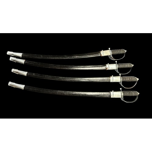 57 - Four Indian Cavalry Swords. In Black canvas sheaths. Blades 73cm in length, suffering with rust mark... 