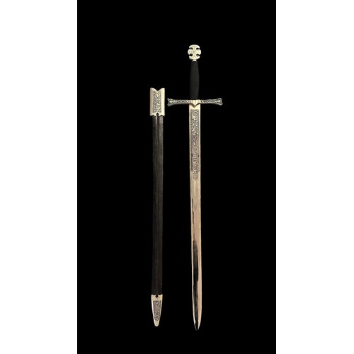 57A - A Pair Of Replica Swords. A Excalibur styled sword with 'Tanto Monta' inscribed. Believed to be styl... 