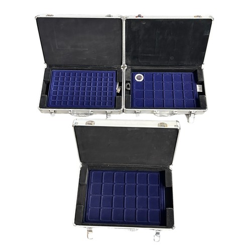 262A - Metal coin cases (3) each with carrying handle, selection of fitted trays for coins of various sizes... 