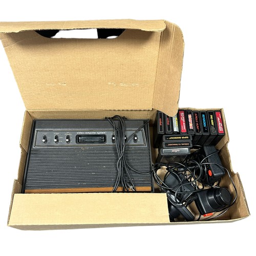 41 - Atari CX-2600 console in good original box, with paperwork, 2x joystick, 2x paddle controllers, 1x p... 