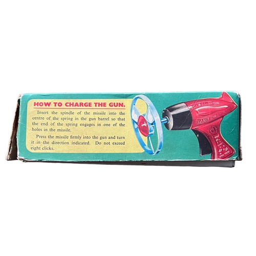 21 - A Dan Dare Planet Gun by Merit, complete, in original box. Box has a tear and internal repair to one... 