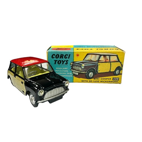 145 - Corgi Mini-Cooper De-luxe No. 249, generally excellent in excellent to good plus box (some damage to... 