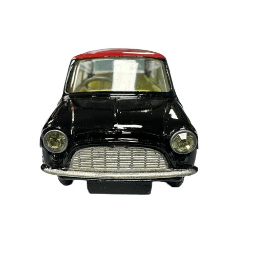 145 - Corgi Mini-Cooper De-luxe No. 249, generally excellent in excellent to good plus box (some damage to... 