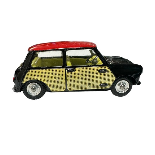 145 - Corgi Mini-Cooper De-luxe No. 249, generally excellent in excellent to good plus box (some damage to... 