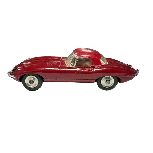 174 - Corgi Jaguar E-Type dark red including detachable hardtop and brown interior No. 307, generally exce... 