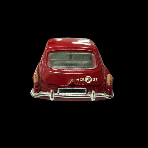 190 - Corgi MGB GT dark red with light blue interior, wire wheels and black suitcase No. 327, generally ex... 