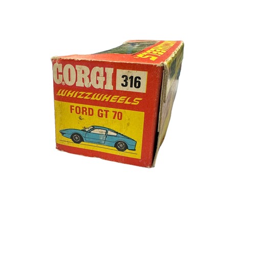 279 - Corgi Whizzwheels Ford GT 70 No. 316, generally excellent in good plus window box including unapplie... 