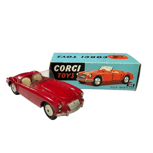 167 - Corgi MGA Sportscar red with cream seats No. 302, generally excellent in good plus box (small tear t... 