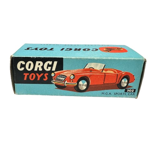 167 - Corgi MGA Sportscar red with cream seats No. 302, generally excellent in good plus box (small tear t... 