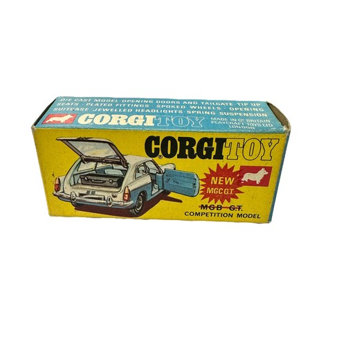 199 - Corgi MGC GT Competition yellow with black bonnet and hatch, wire wheels No. 345, generally excellen... 