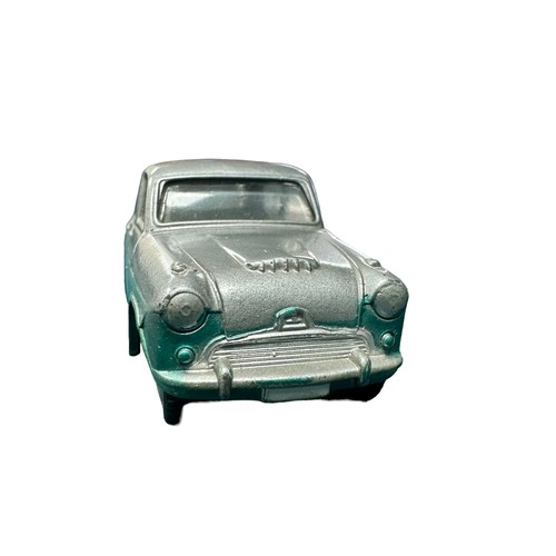 105 - Corgi Austin Cambridge two-tone silver and turquoise and flat spun hubs No. 201, generally excellent... 