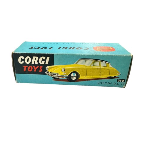 112 - Corgi Citroen D.S. 19 primrose yellow with red roof No. 210, generally excellent to good plus (decal... 