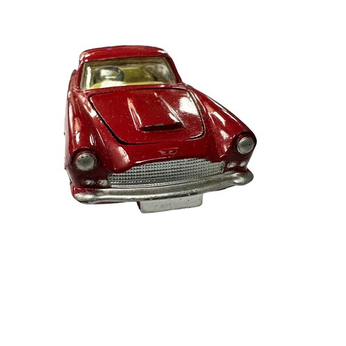 118 - Corgi Aston Martin DB4 red with lemon interior and accessory decal wheels) No. 218, generally excell... 