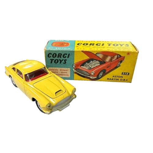 119 - Corgi Aston Martin DB4 yellow with red interior and flat hubs No. 218, generally excellent in good p... 